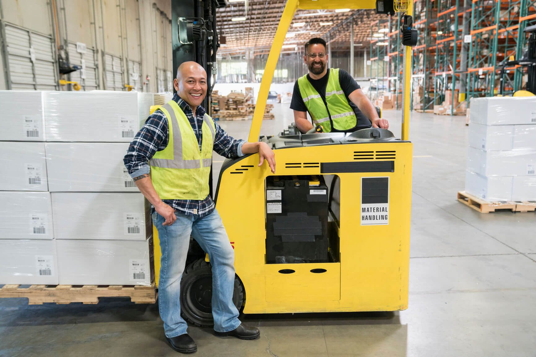 two forklift drivers